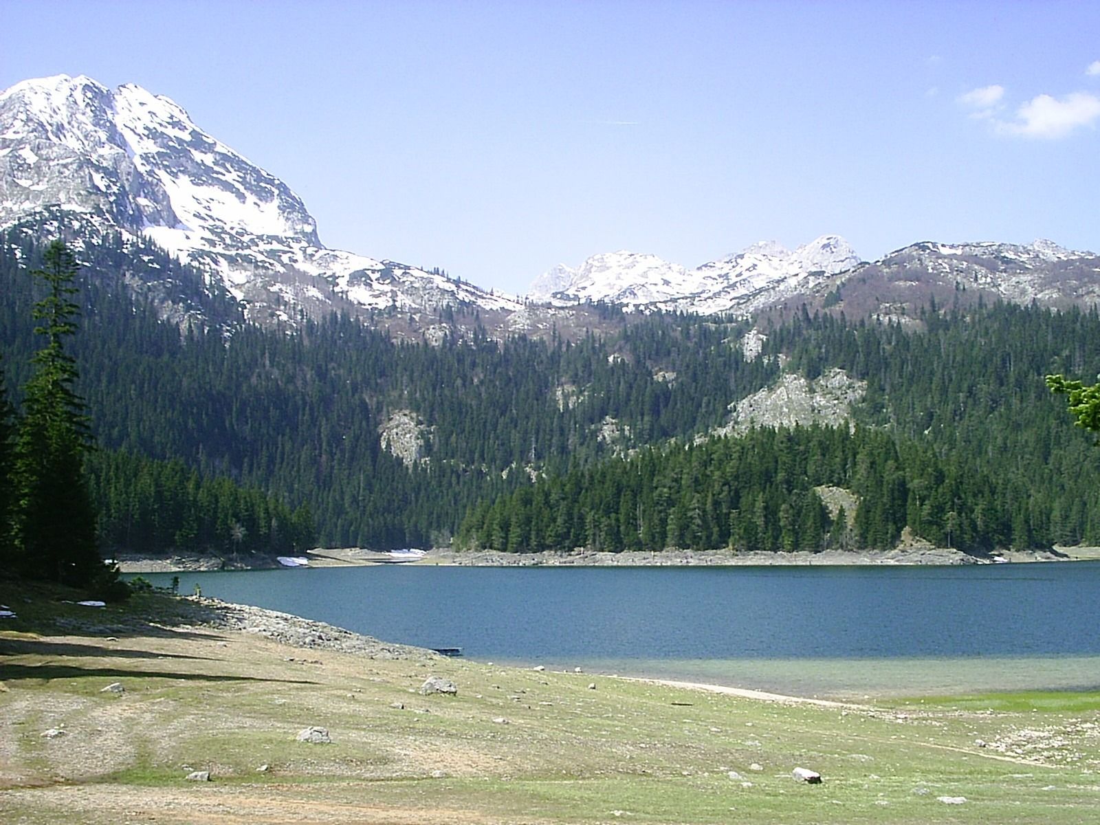 The beautiful Black Lake (Crno Jezero) in Durmitor National Park, with the snow-capped Međed peak in the background.