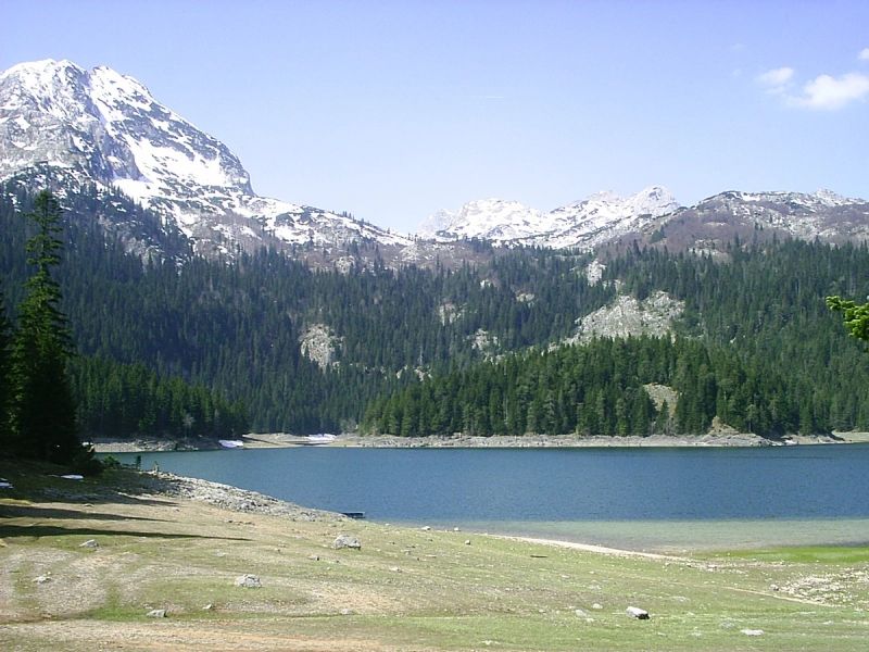 The beautiful Black Lake (Crno Jezero) in Durmitor National Park, with the snow-capped Međed peak in the background.