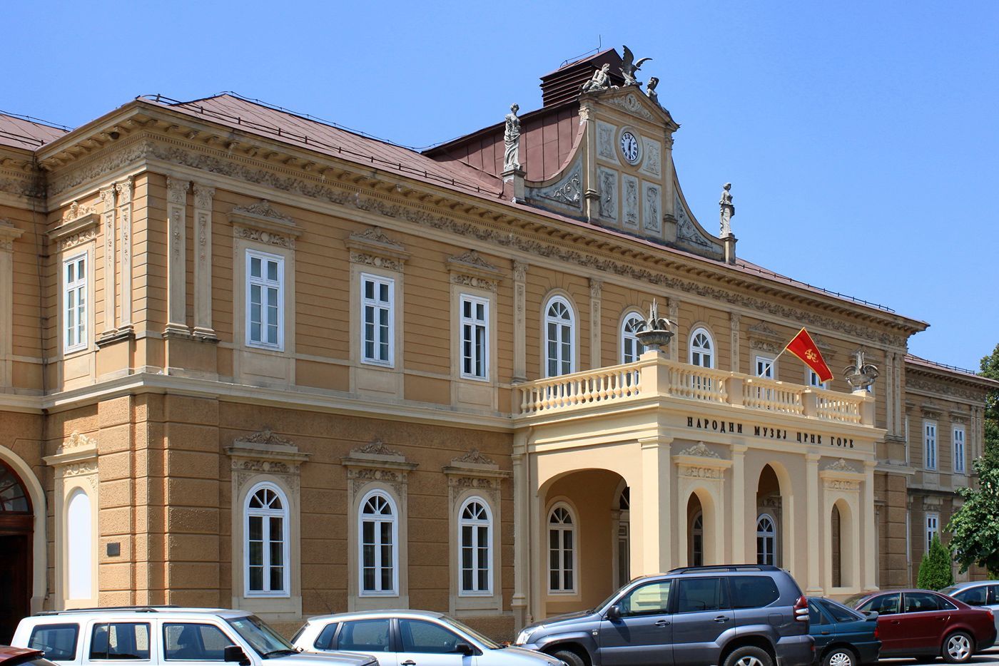 The historic neo-baroque building of the National Museum of Montenegro in Cetinje on a sunny day.