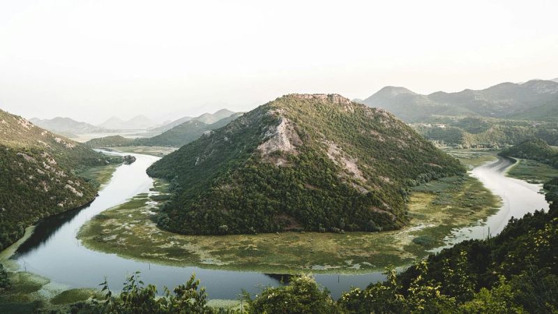 The iconic horseshoe bend of the Rijeka Crnojevića river at Pavlova Strana viewpoint, Skadar Lake National Park.