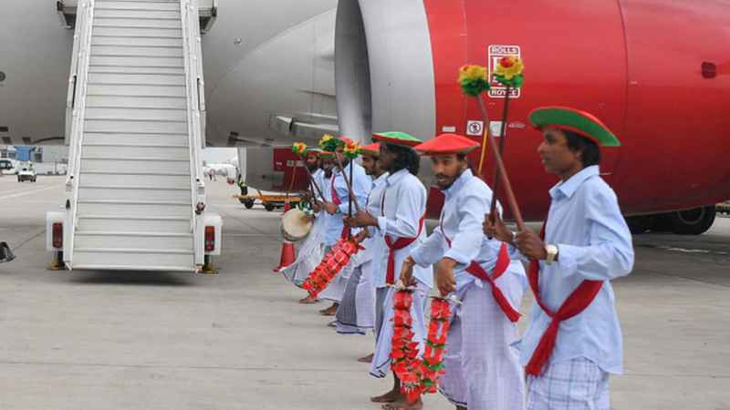 Tourists arriving on British Airways receiving a traditional welcome reception at Velana International Airport