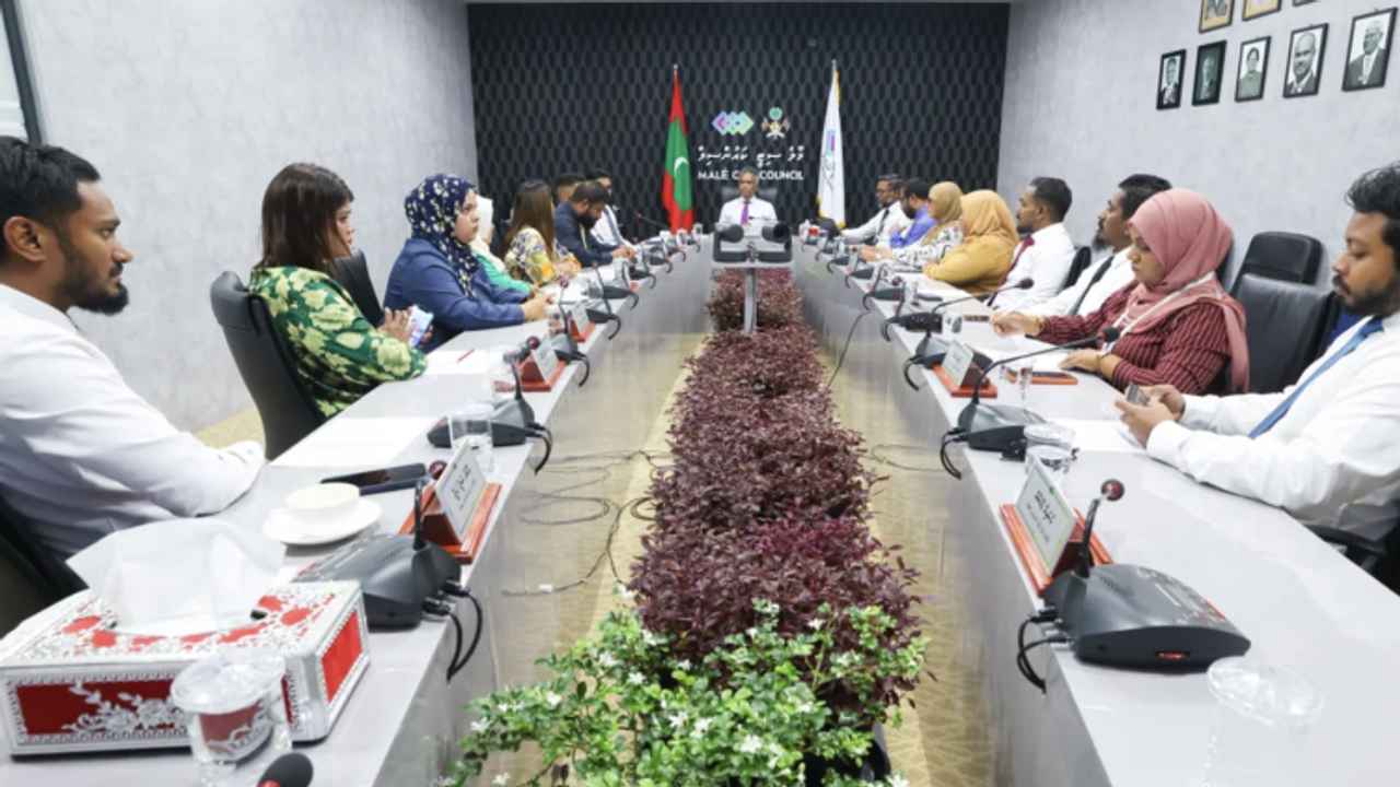 Members of Malé City Council seated at a council meeting