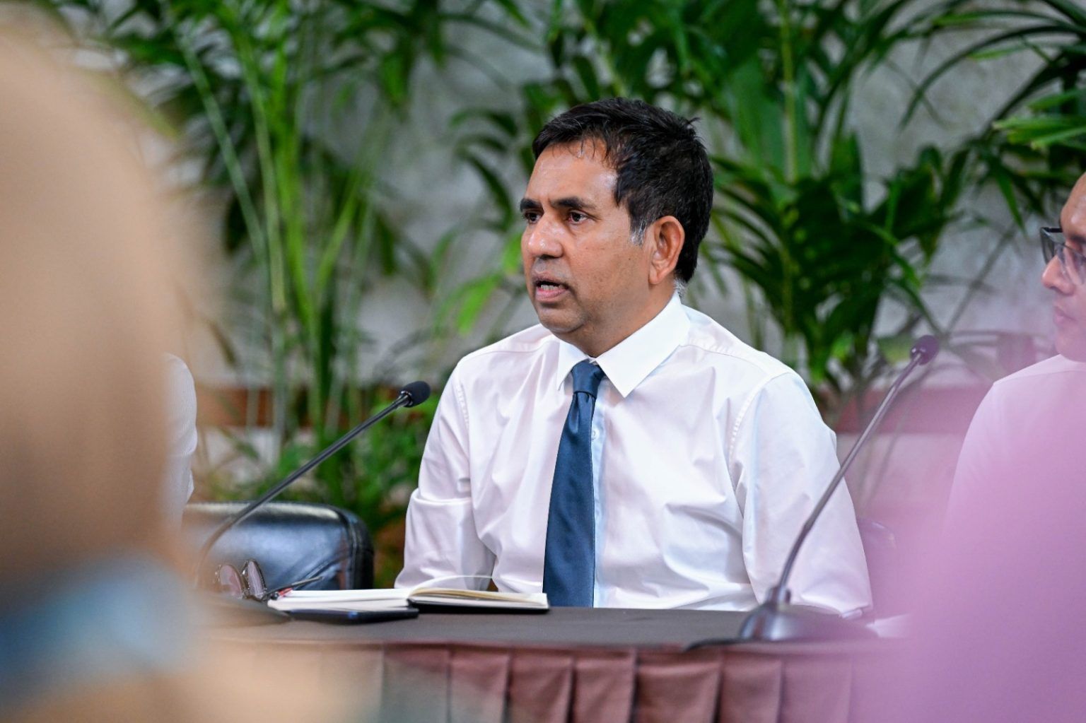 Economic Minister Saeed speaking at the Weekly Press Briefing at President's Office.