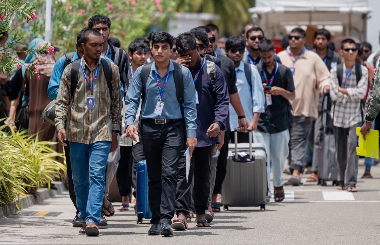 Participants of the National Service Training Programme departing for training camp.