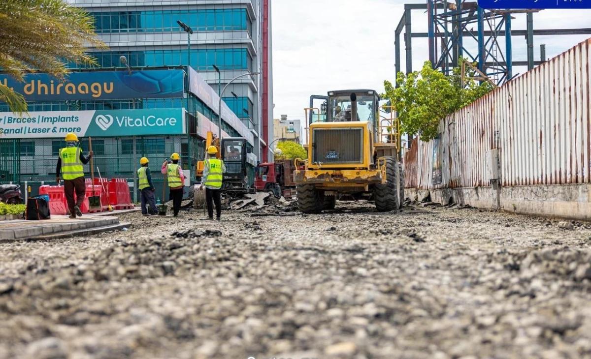 Equipment and workers repairing Ameenee Magu near Maafannu