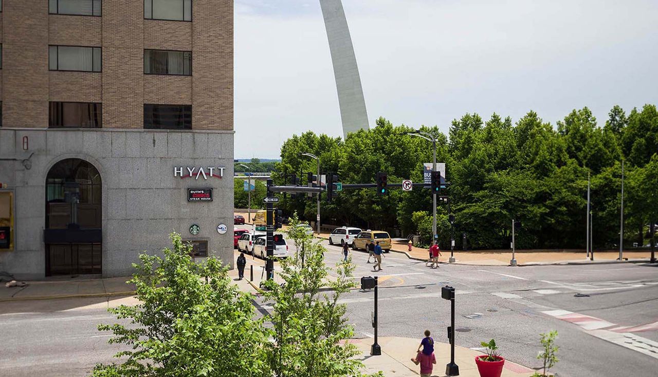 Photo of the st louis arch from the west side with a small portion of the new green plaza by arbolope studio.
