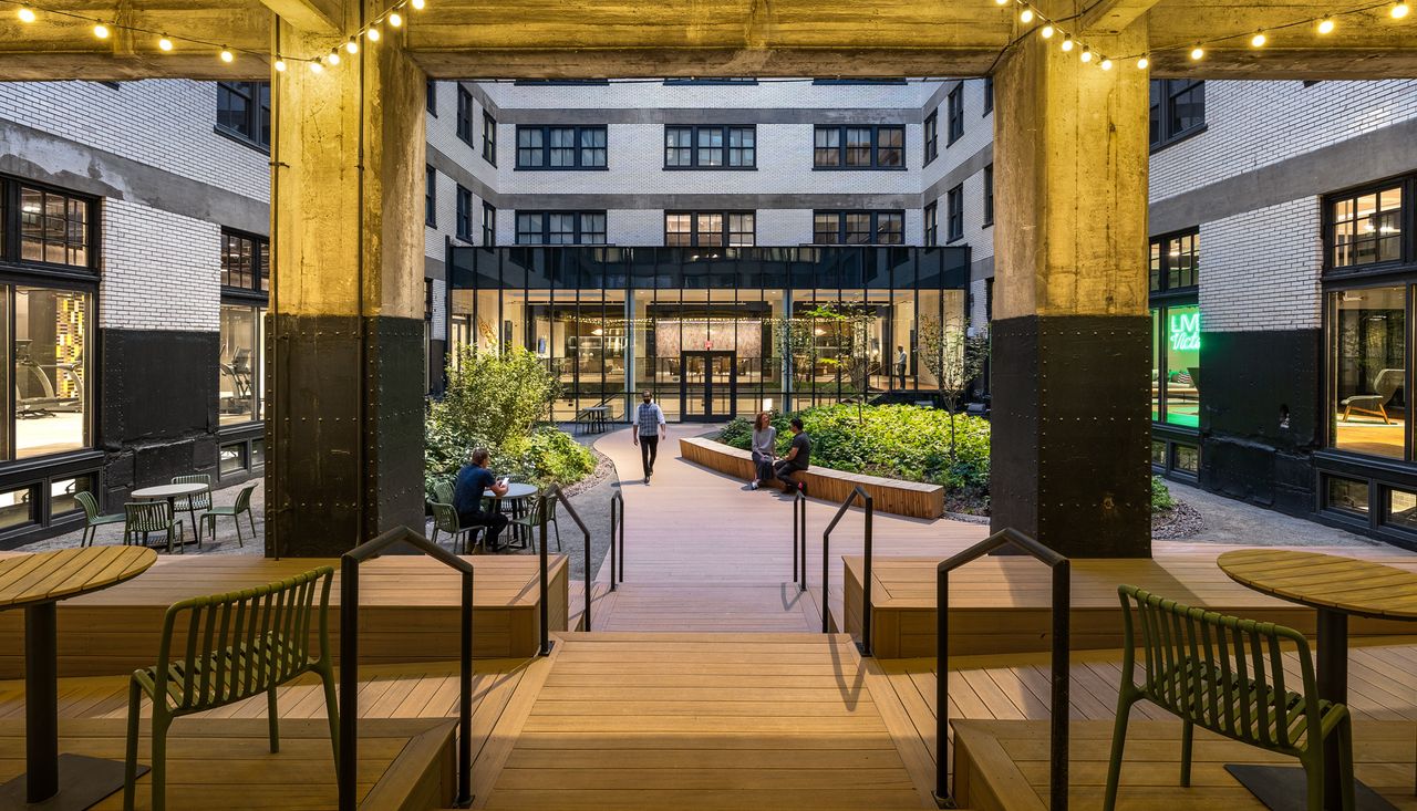 The Victor (Butler Brothers Building) by Arbolope Studio, Photo from underneath the overhang inside the central courtyard at the butler brothers building in St. Louis Missouri.