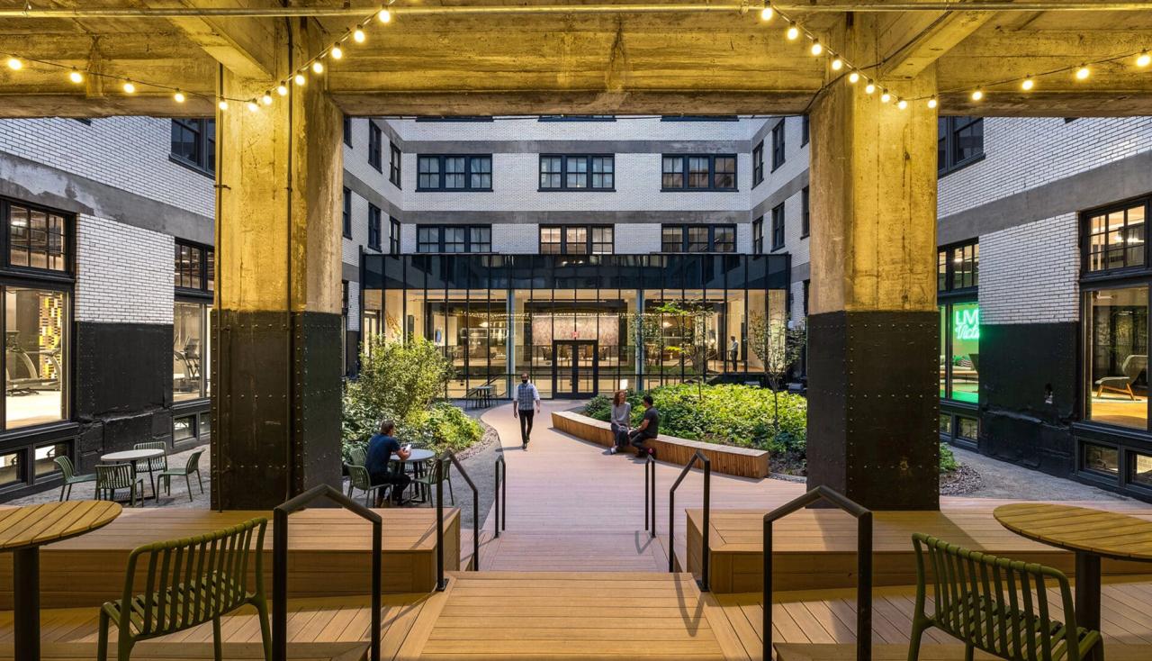 Photo from underneath the overhang inside the central courtyard at the butler brothers building in St. Louis Missouri, new landscaping designed by Arbolope Studio.