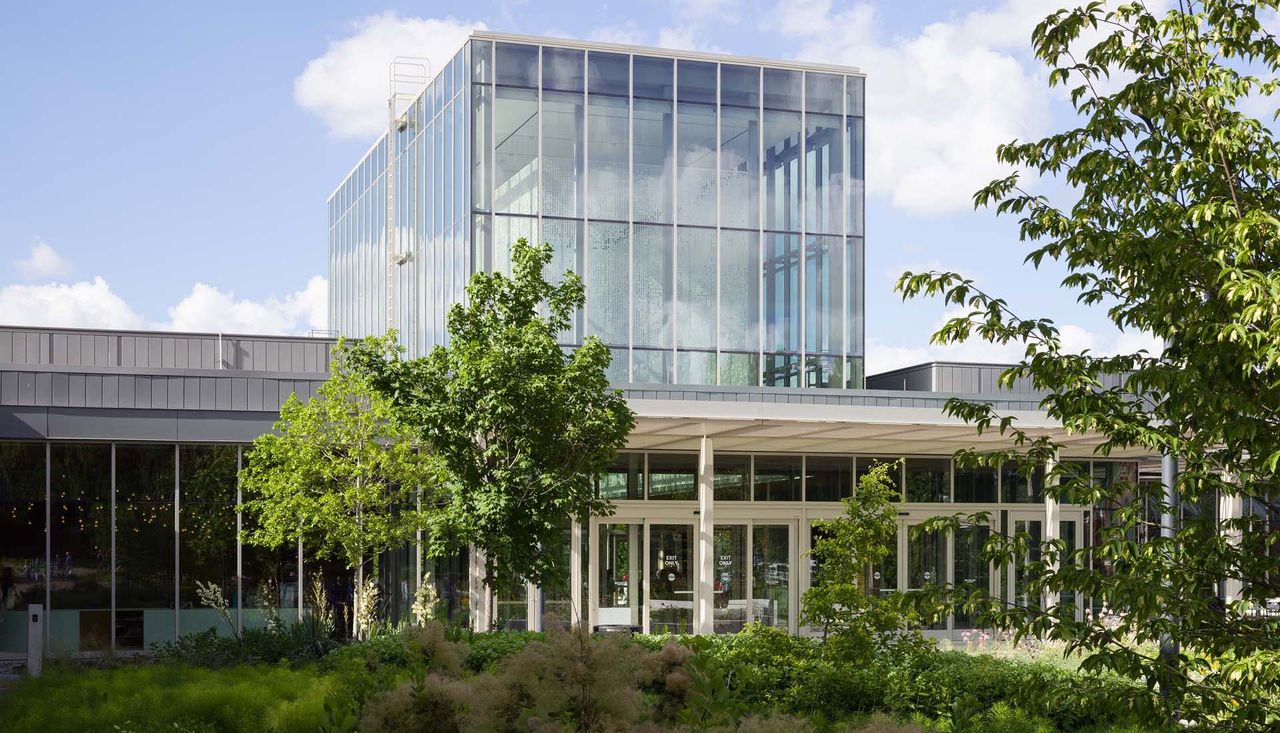Photo of new building on a sunny day outside of the jack c taylor visitor center at the missouri botanical gardens designed by arbolope studio.