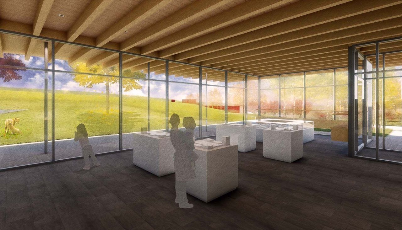 Inside view of the new building gift shop with people for frank lloyd wright house at ebsworth park in st louis missouri.