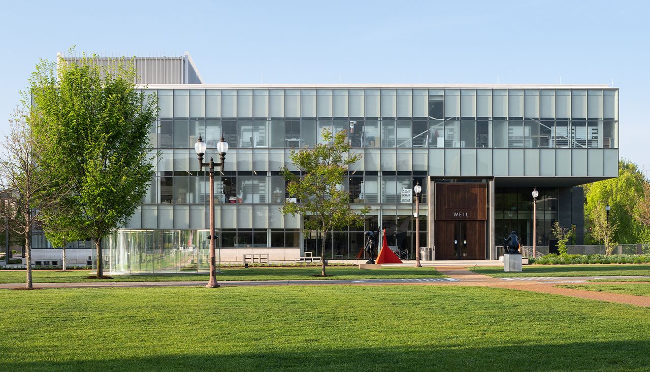 People walking through Biselected circle at washington university saint louis missouri project completed by arbolope studio