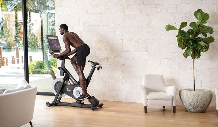 How to get the most out of your exercise bike: 4 Top Tips from a PT