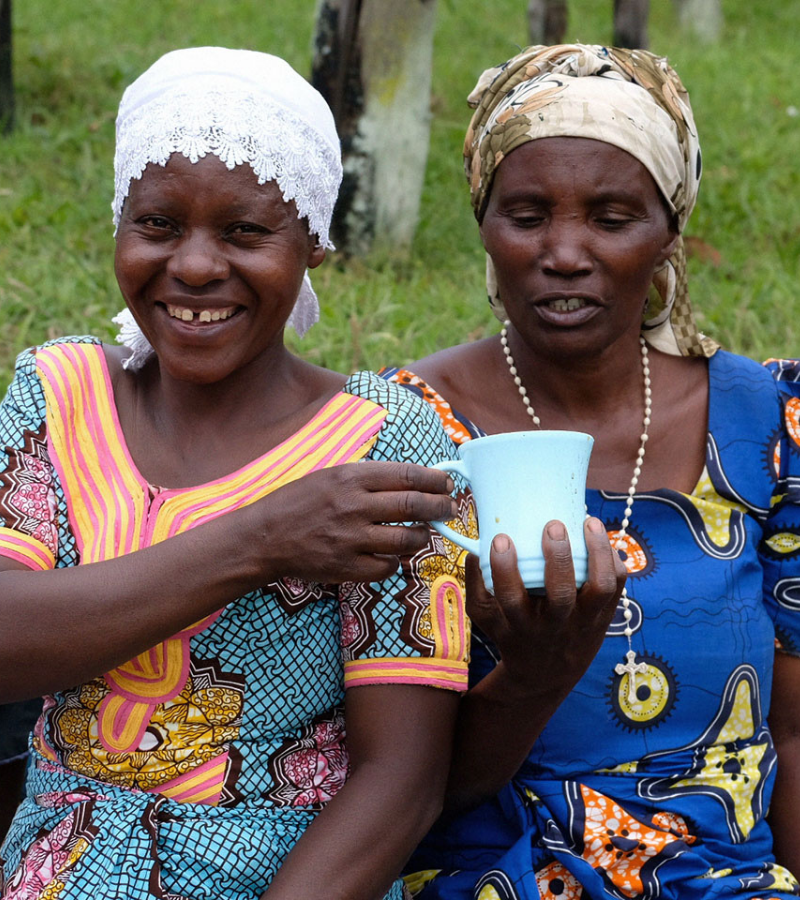 Nziza women with coffee