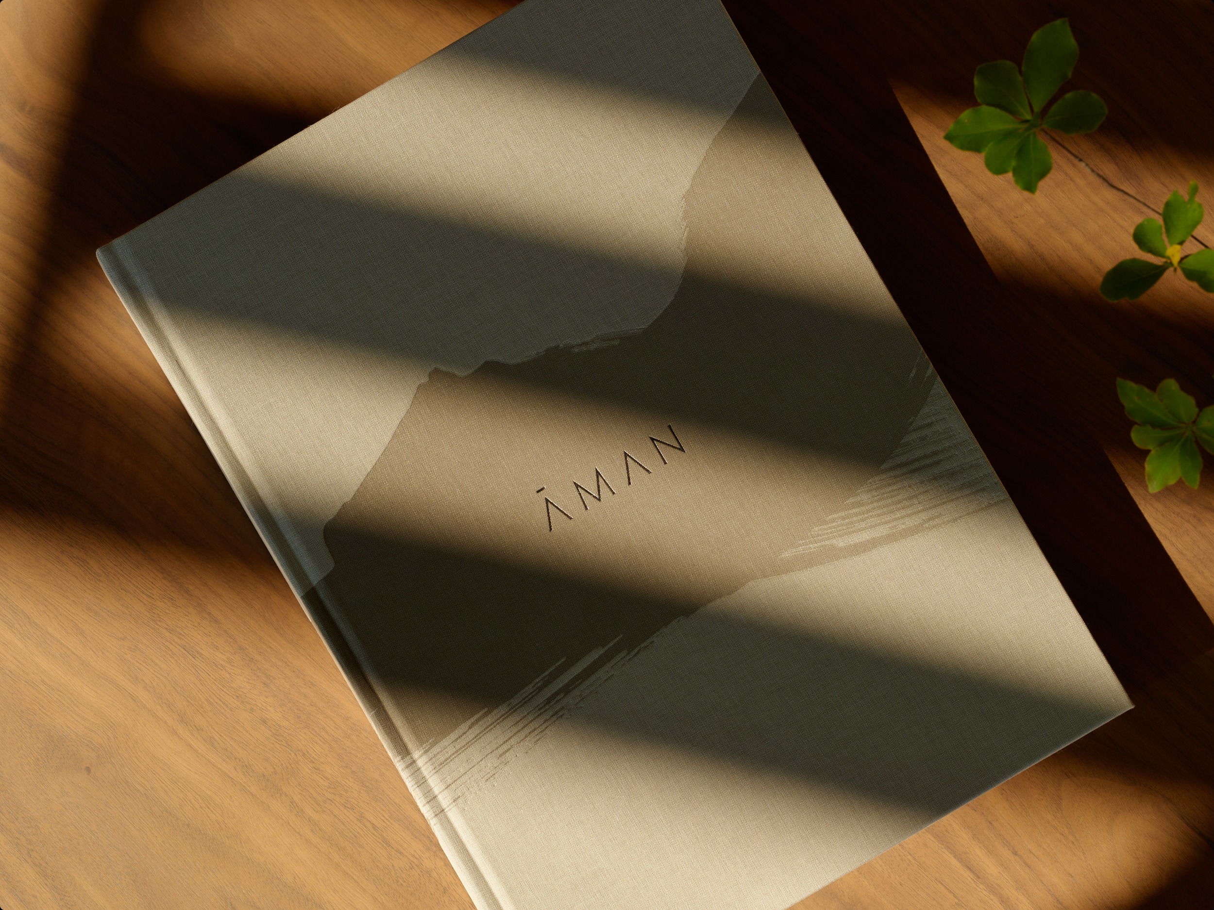 A mark of expression. The fine linen cover design for the Aman ‘Places of Peace’ book