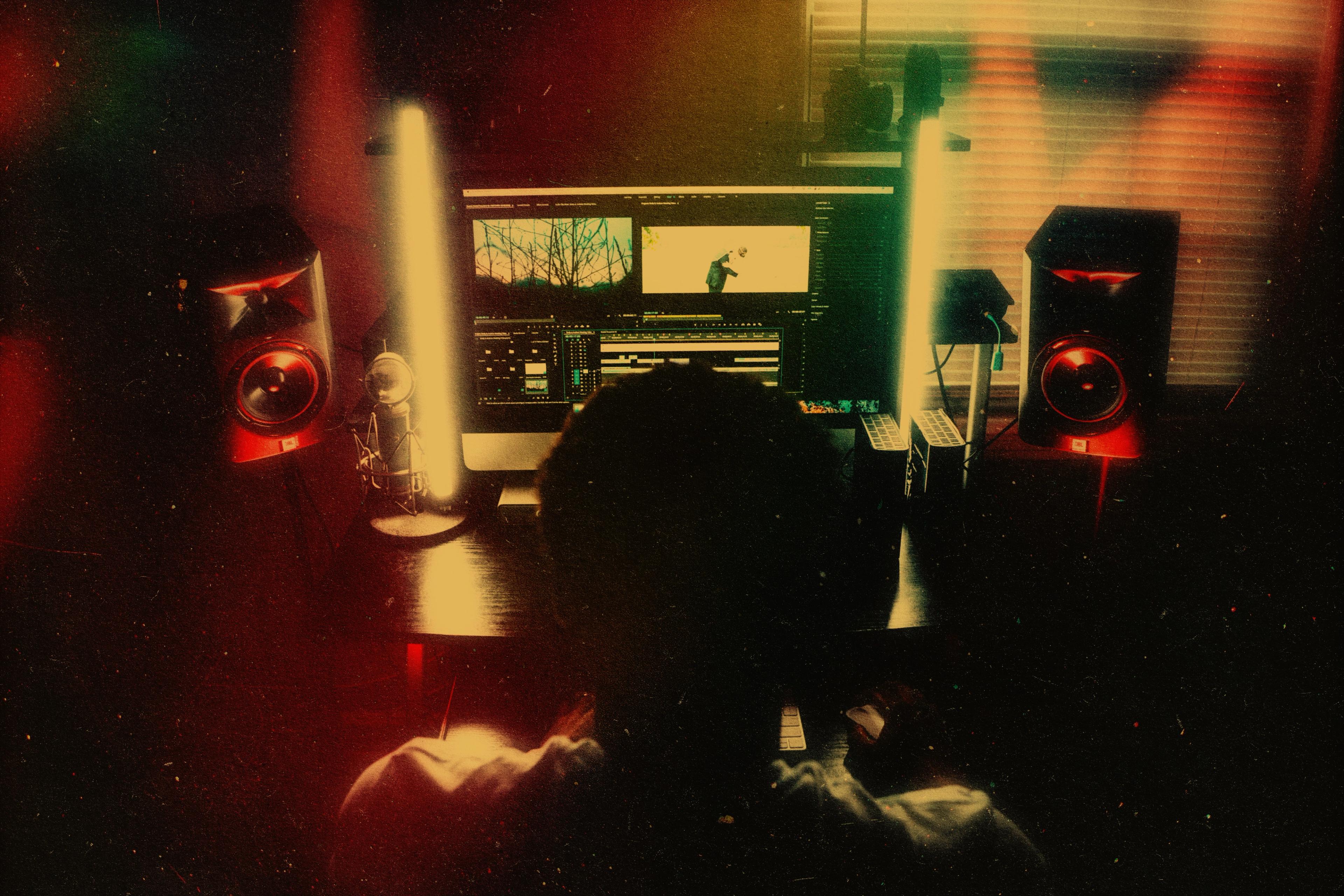 Producer creating a TV soundtrack in a studio