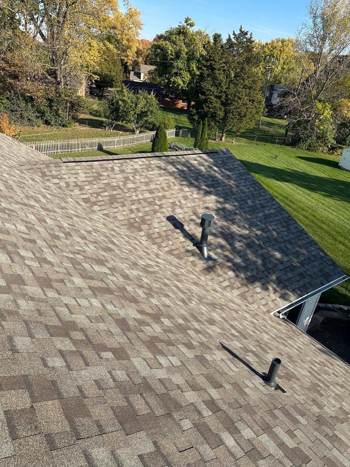 The finished back slope in Driftwood shingles above the back lawn, Beavercreek, Ohio.