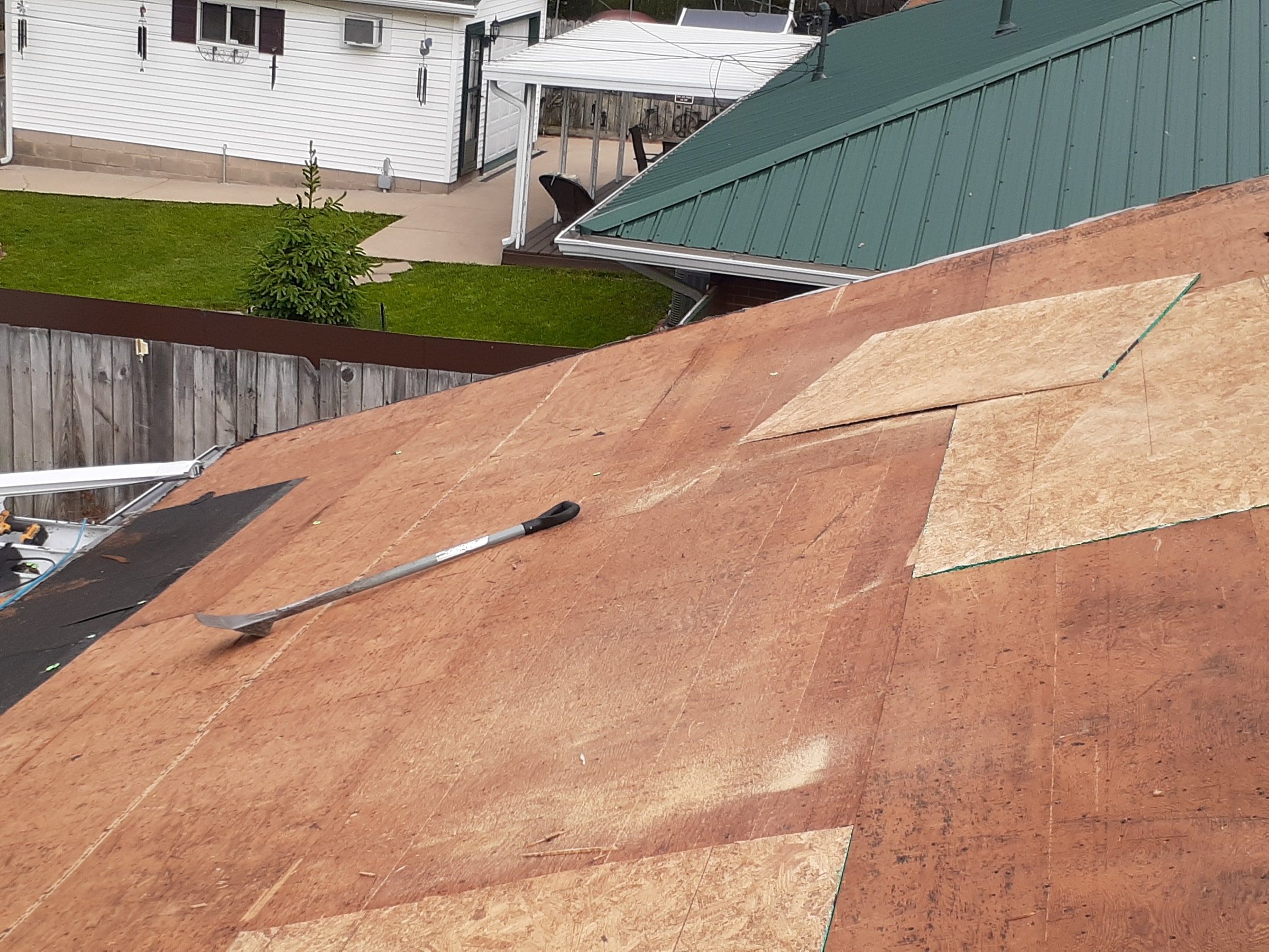 New OSB sections near the ridge of the old plywood deck, Huber Heights, Ohio.