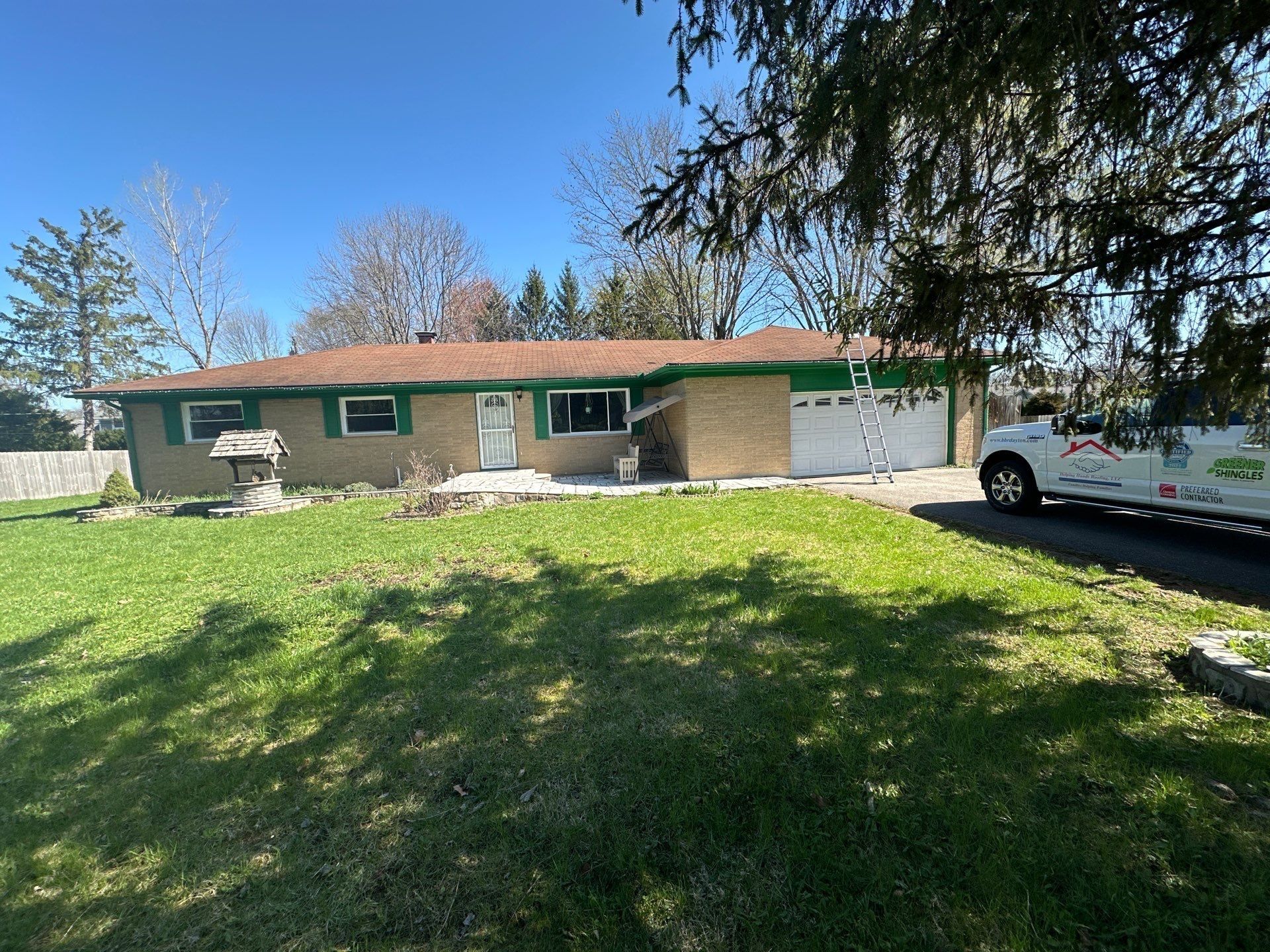 Front of the brick ranch home with its old shingle roof before any work, Beavercreek, Ohio.