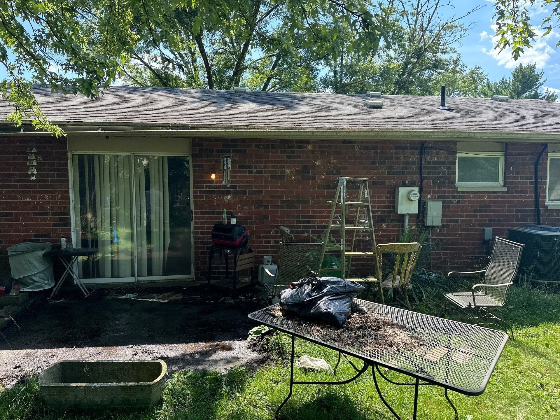 Brick ranch rear and original gutters