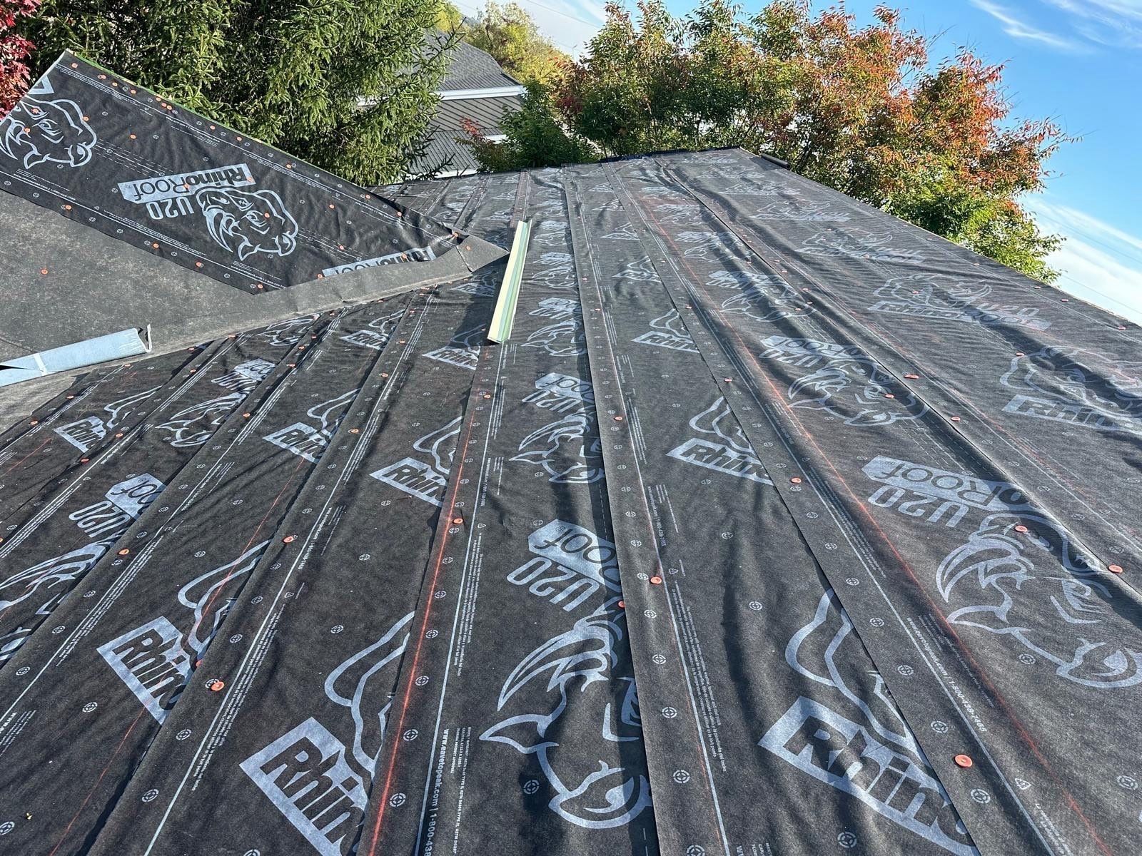 Courses of underlayment running up to the ridge, Beavercreek, Ohio.