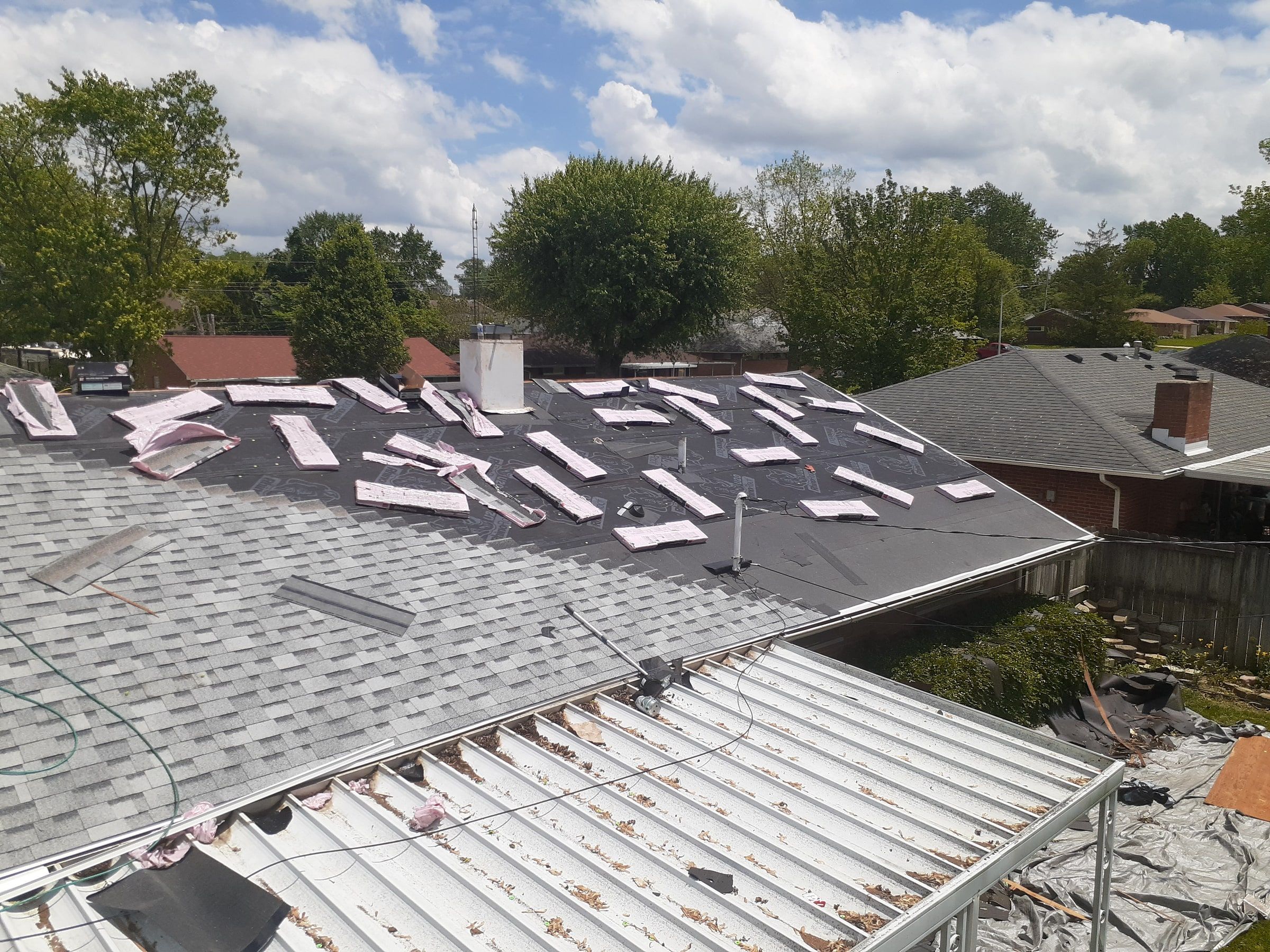 Bundles waiting on the underlayment of the back slope, Huber Heights, Ohio.