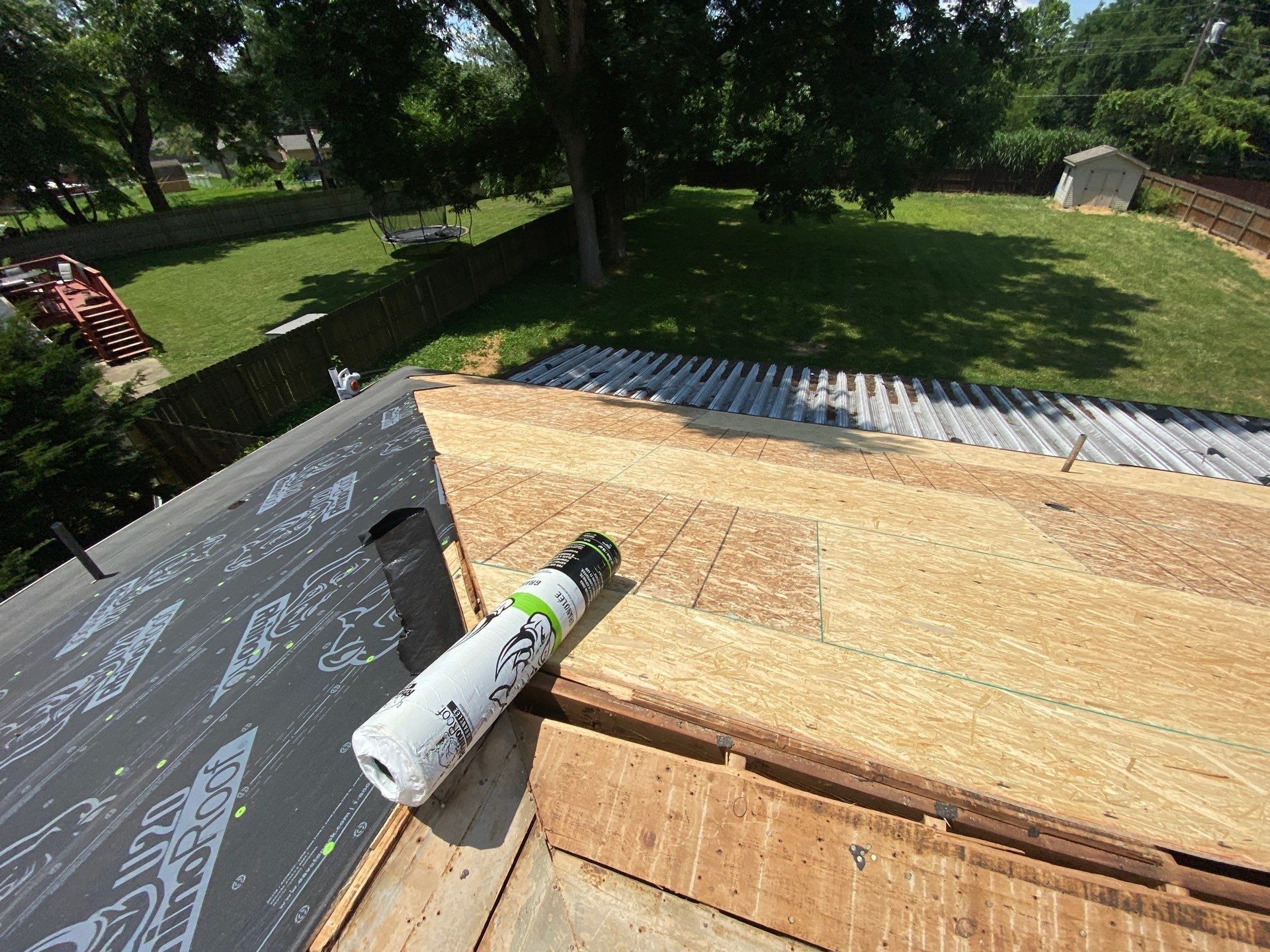 Ridge vent slot cut open along the peak of the new sheathing, Beavercreek, Ohio.