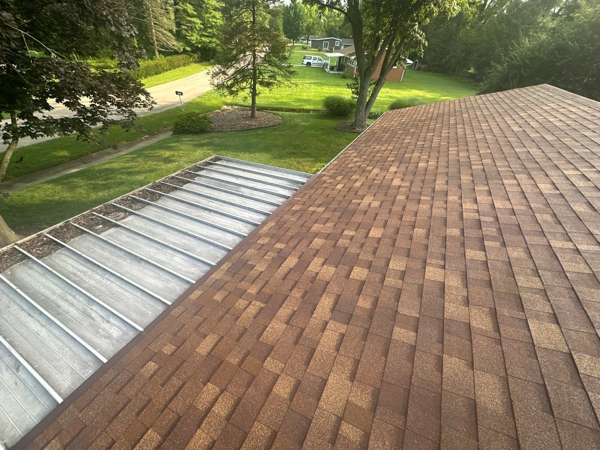 The finished brown shingles above the patio cover, Beavercreek, Ohio.