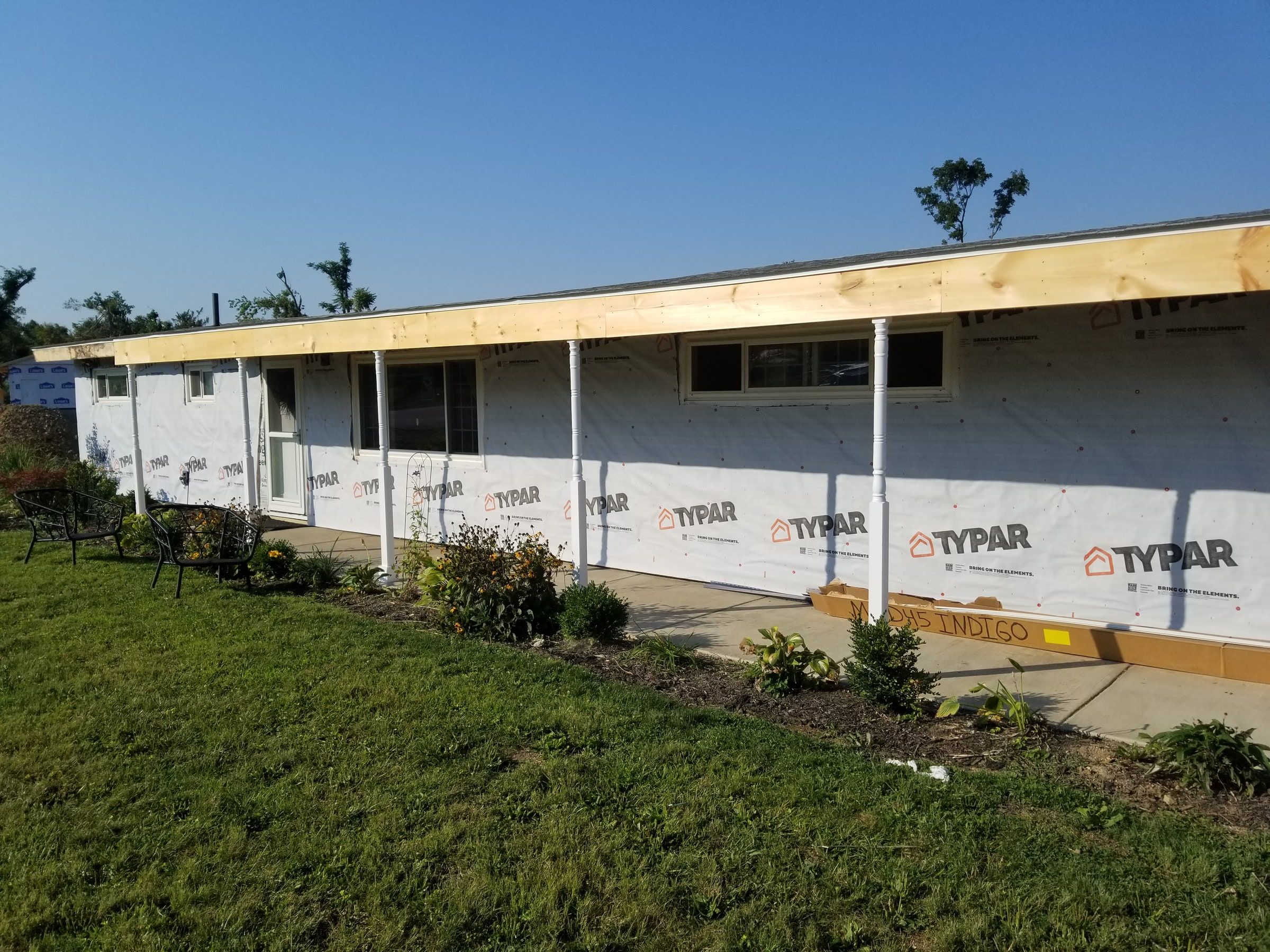 House wrap down the length of the porch wall, Beavercreek, Ohio.