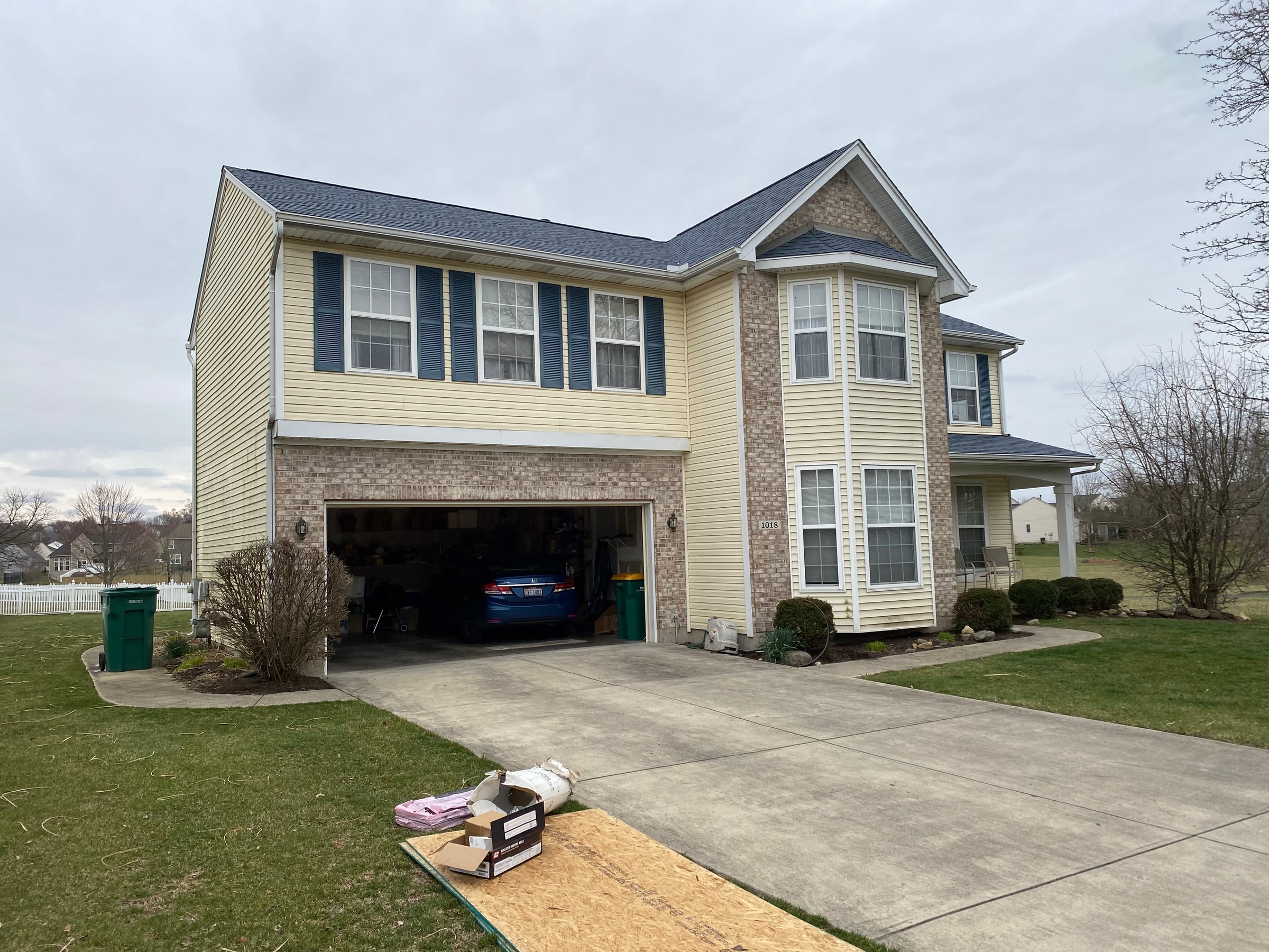 Front elevation head-on, garage to bay