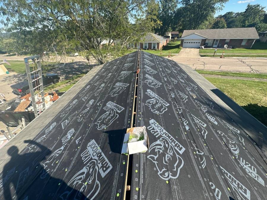 Underlayment on both sides of the ridge, with the ridge left open for the vent, West Carrollton, Ohio.