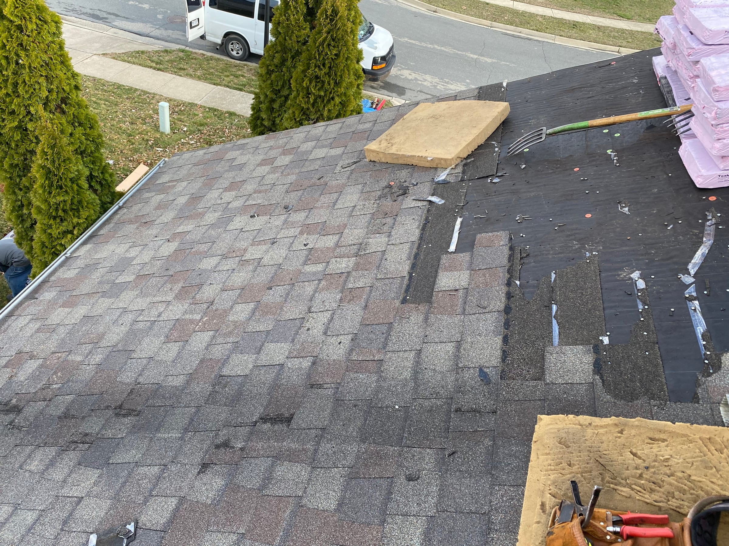 Plane of old shingles and stripping shovel