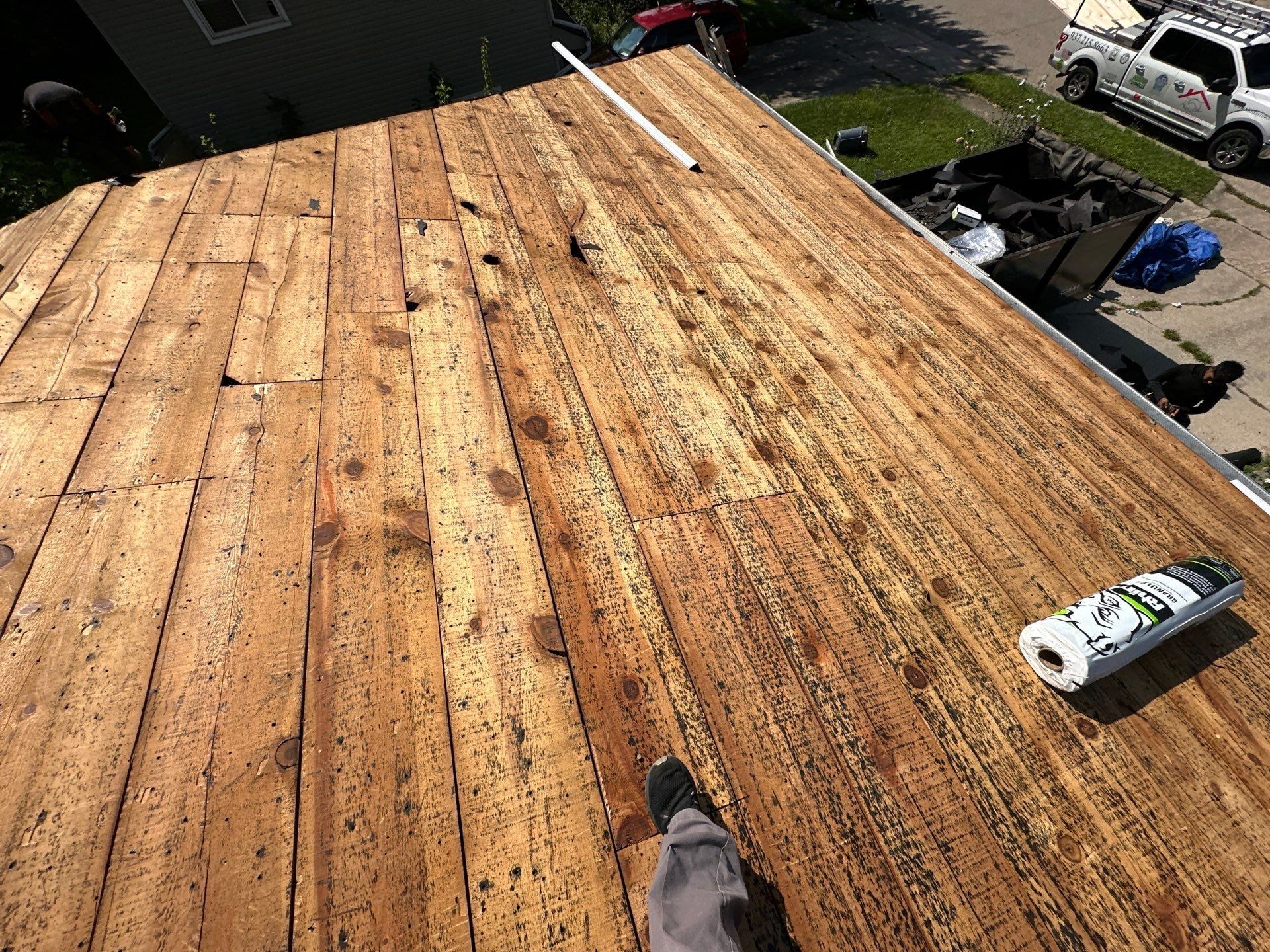 Tight 1x boards cleaned to bare wood above the driveway, Fairborn, Ohio.