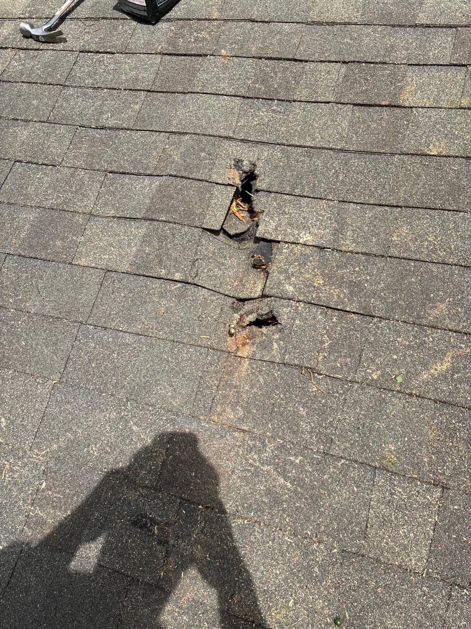 Puncture through the shingle surface