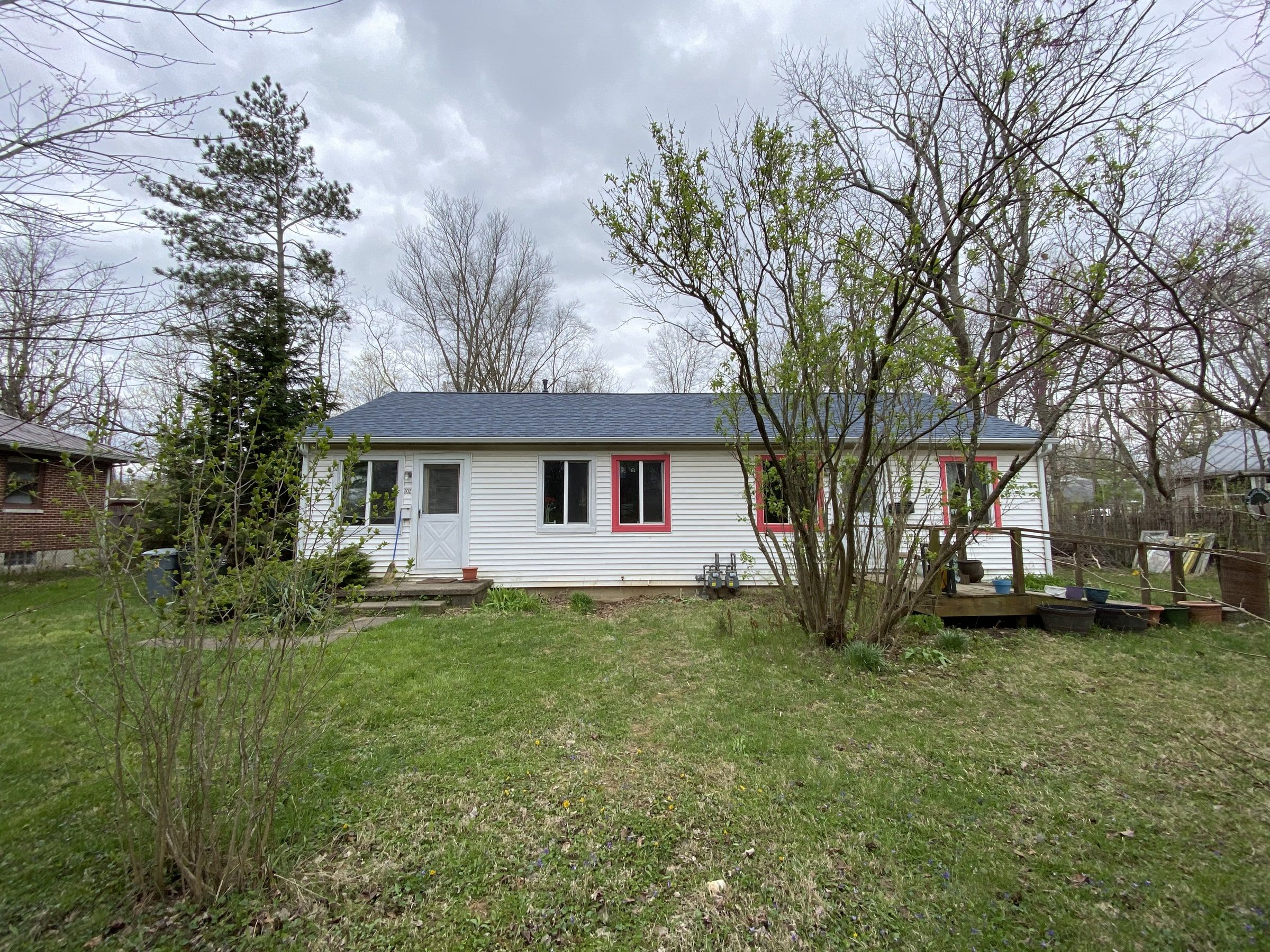 The back of the house with the finished roof, seen across the yard, Yellow Springs, Ohio.