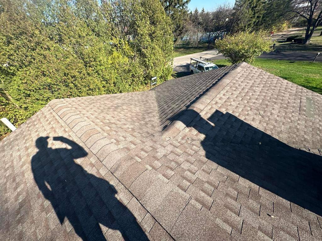 Old tan shingle roof and hips