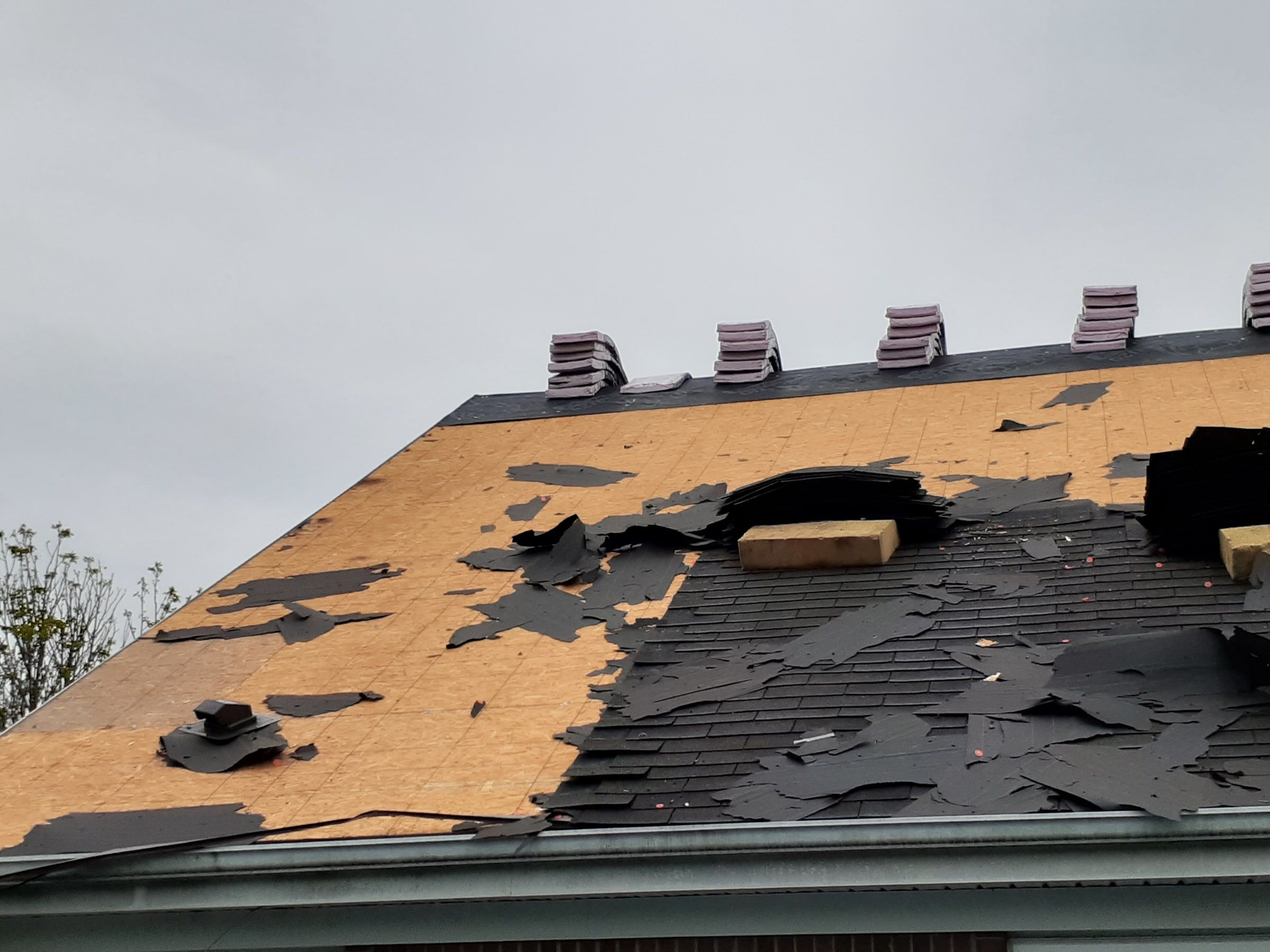 Deck scraped back and tear-off debris