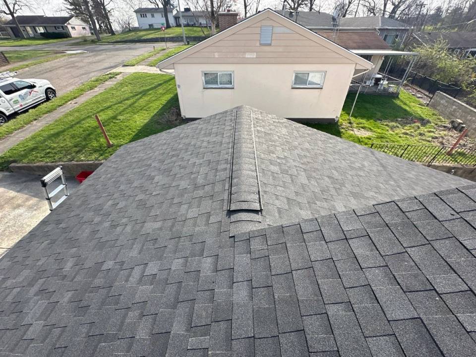 The finished roof and ridge vent above the side yard, Dayton, Ohio.