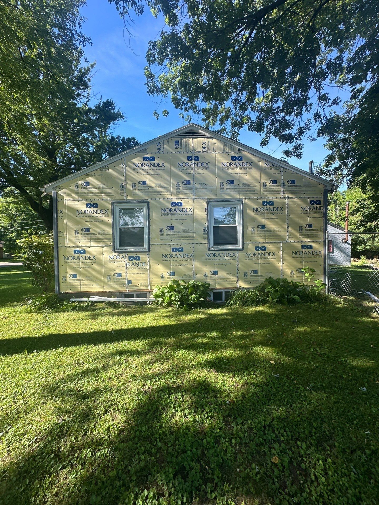 Rear wall in siding board