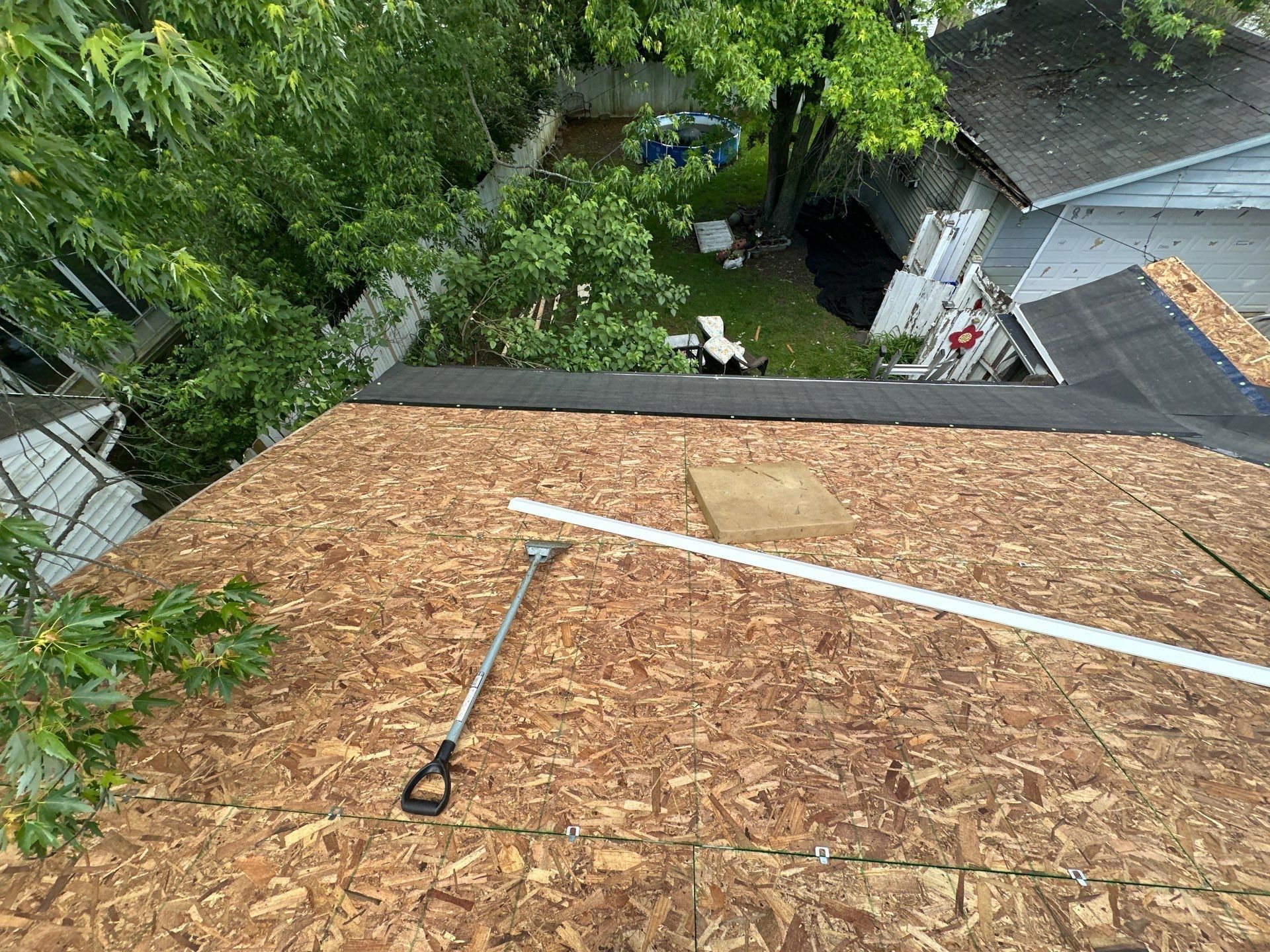 Resheathed plane, shovel and white trim