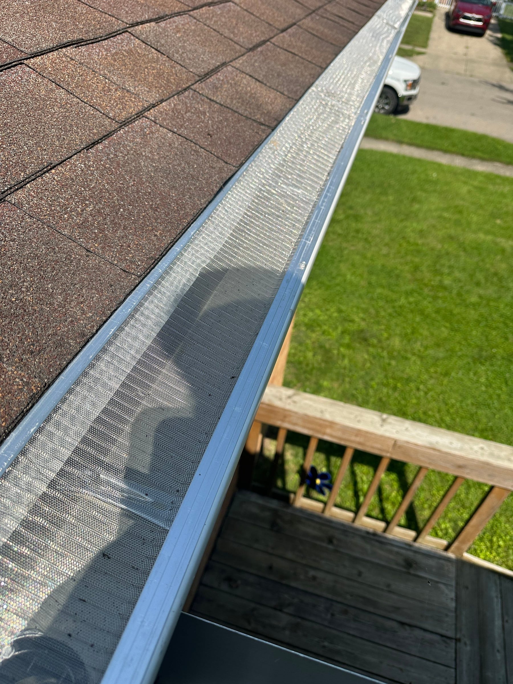 Guarded gutter, deck rail and street