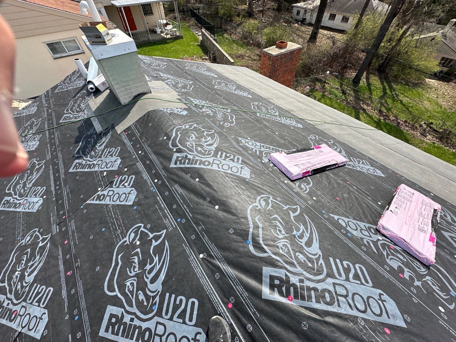 RhinoRoof synthetic underlayment around the faux chimney, Dayton, Ohio.