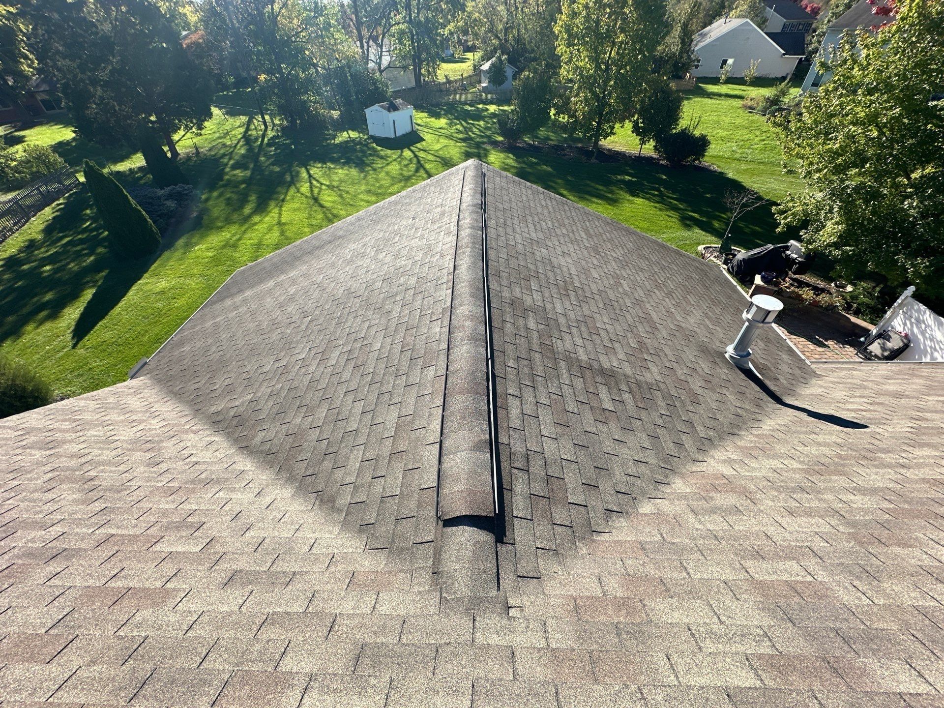 The old roof's hip running down toward the back yard, Beavercreek, Ohio.