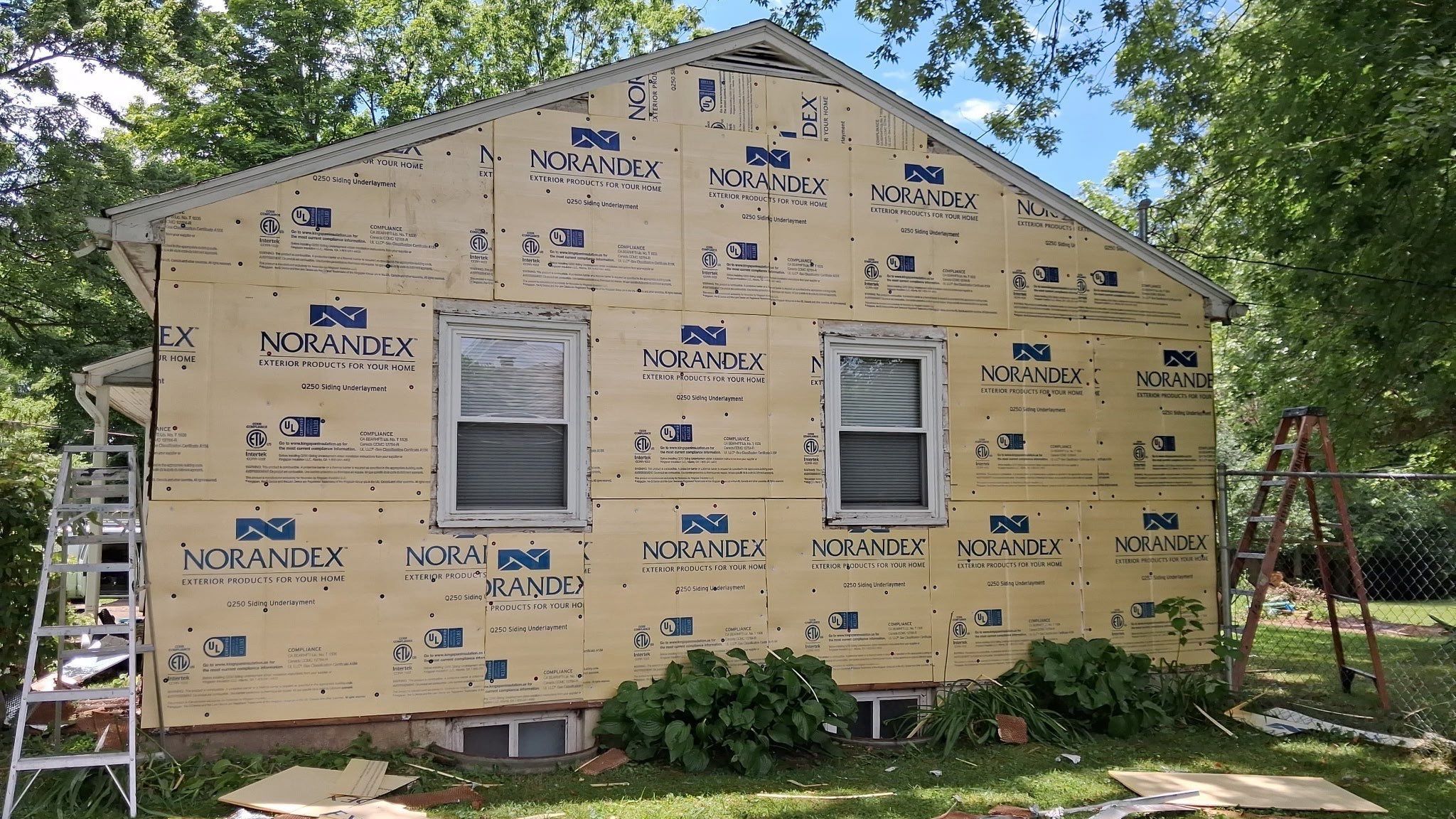 Gable end in siding underlayment board