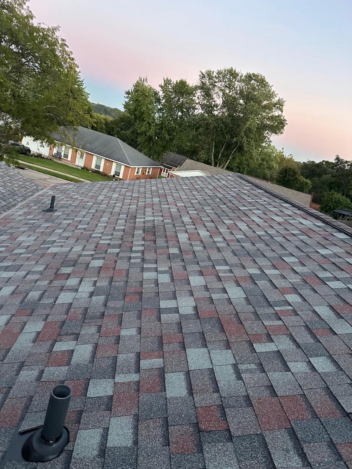 The finished slope with new pipe boots, down to the gutter, West Carrollton, Ohio.
