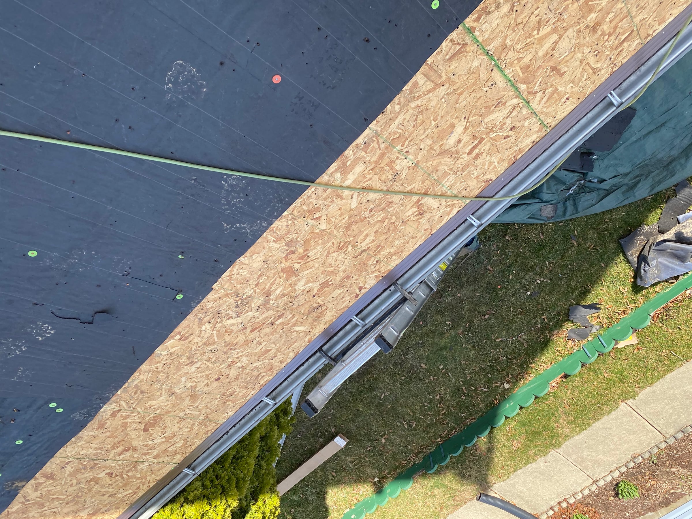 Bare sheathing band at the eave