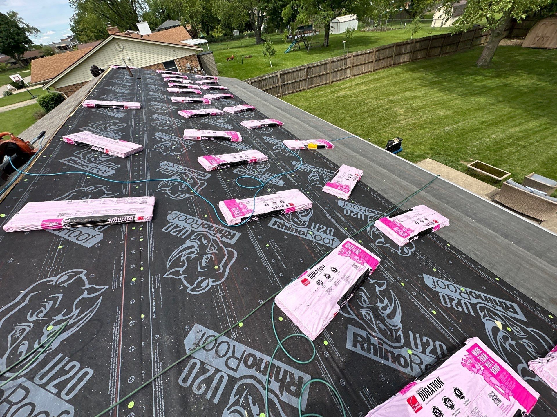 Duration bundles spread across the underlayment on the back slope, Beavercreek, Ohio.