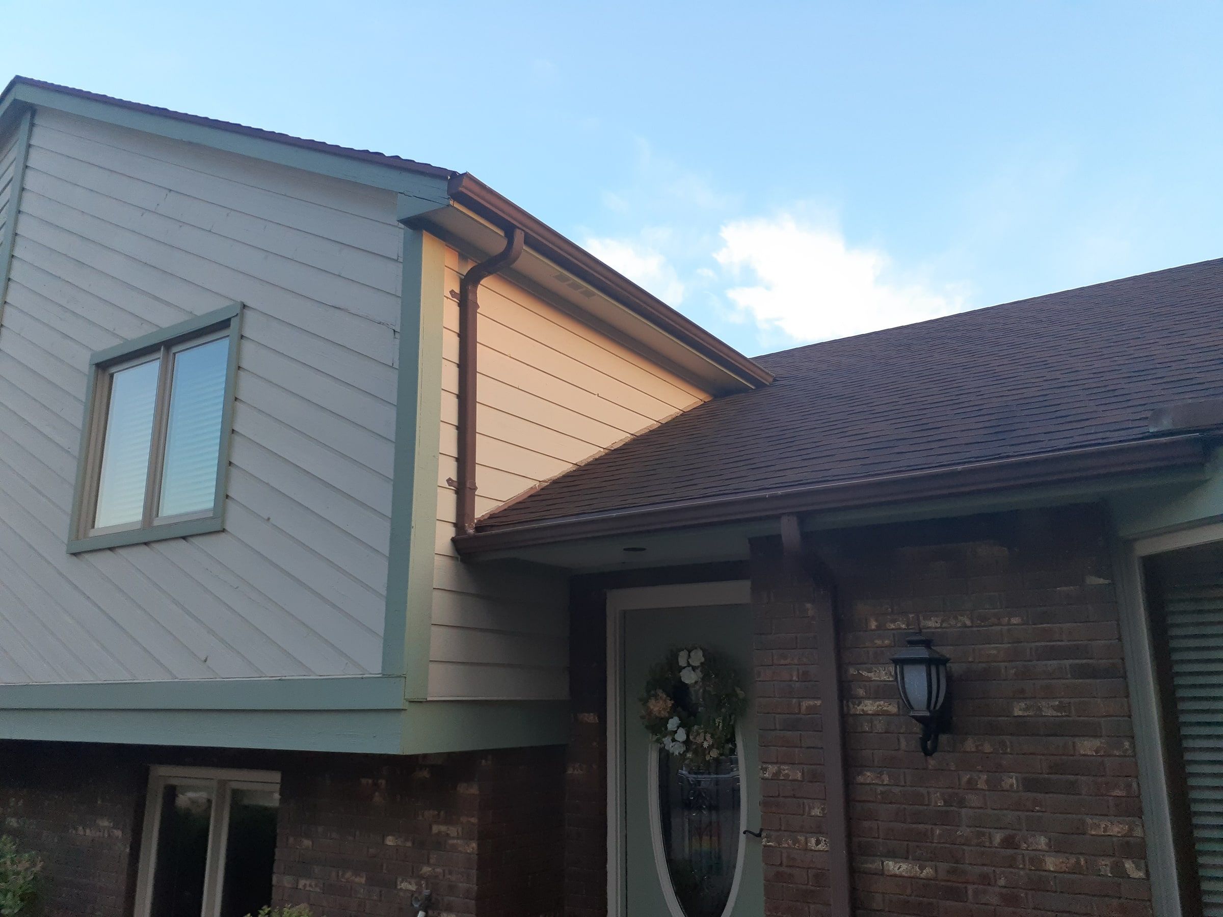 Two story wing meeting the lower front roof over the entry, Jamestown, Ohio.