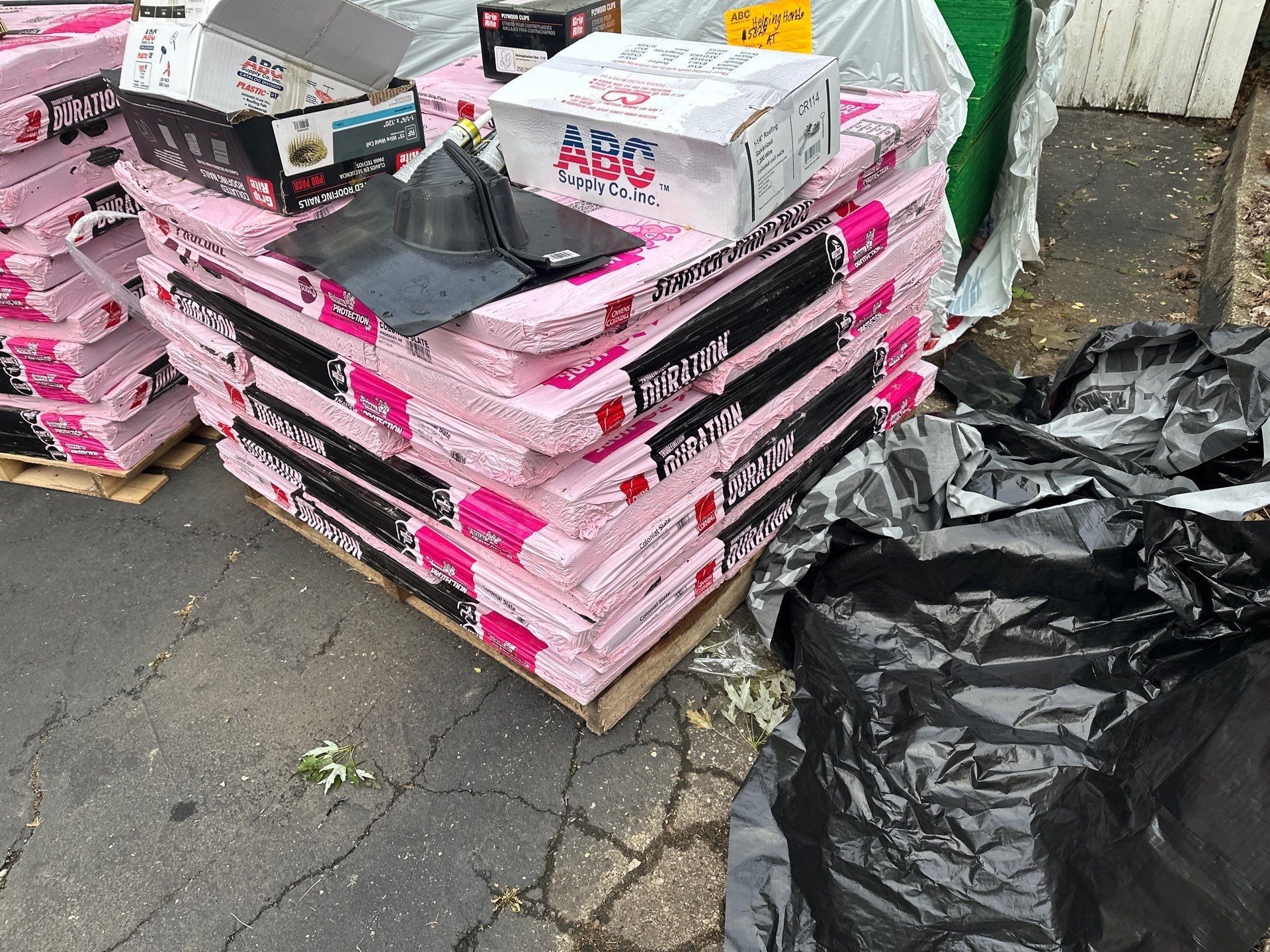Duration shingles, flashing and vent boots stacked in the driveway, Dayton, Ohio.