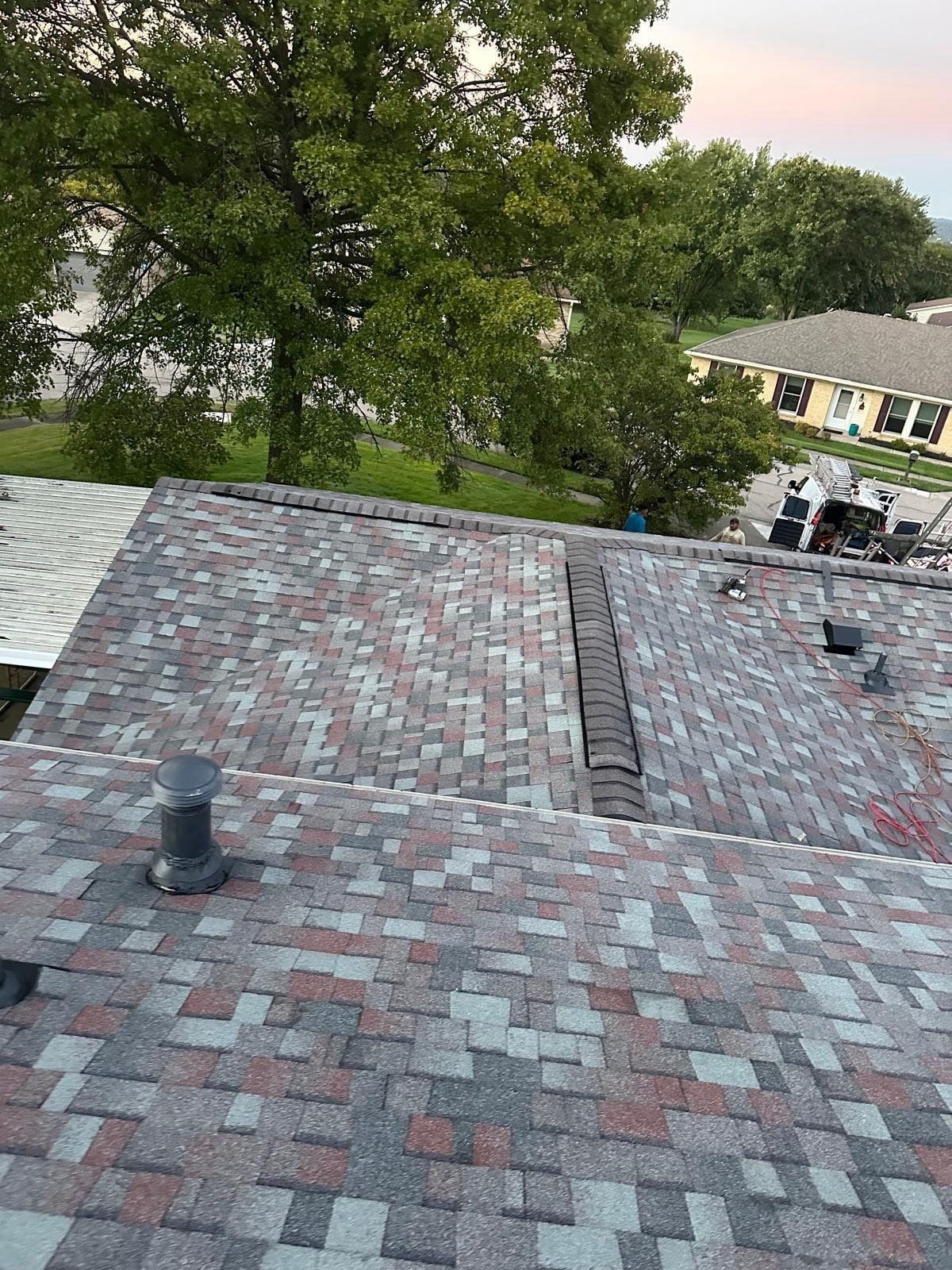 The finished lower roof with ridge vent and new pipe boots, West Carrollton, Ohio.