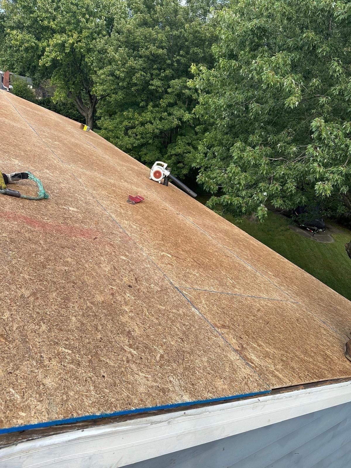 New sheathing on the slope above the trees, Beavercreek, Ohio.